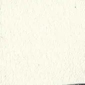 Textured off-white wall with random stippled pattern, dark blue spots, and a horizontal dark gray line at the bottom edge, diffuse lighting.